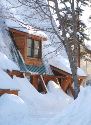 Snowmobiling cabon at New England Outdoor Center in Millinocket