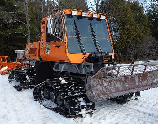 Tucker snocat snowmobile trail groomer