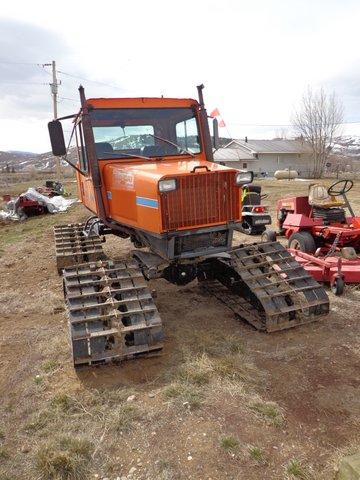 Tucker snocat snowmobile trail groomer